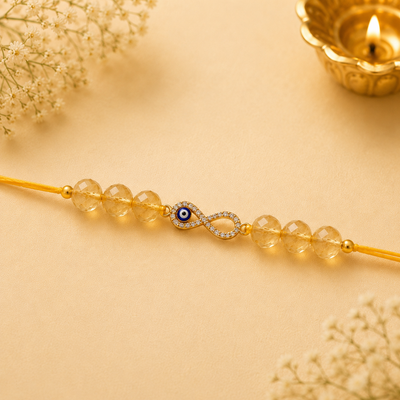 Natural Citrine Rakhi with Infinity Charm & Evil Eye